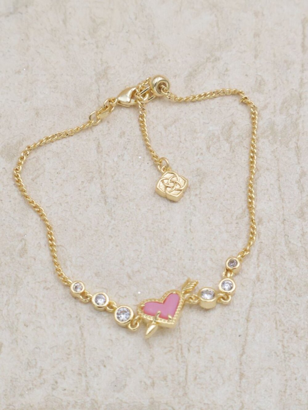 Kendra Scott Ari Heart Arrow Pink Opalescent Resin Tennis Bracelet Gold - Picture 2 of 2